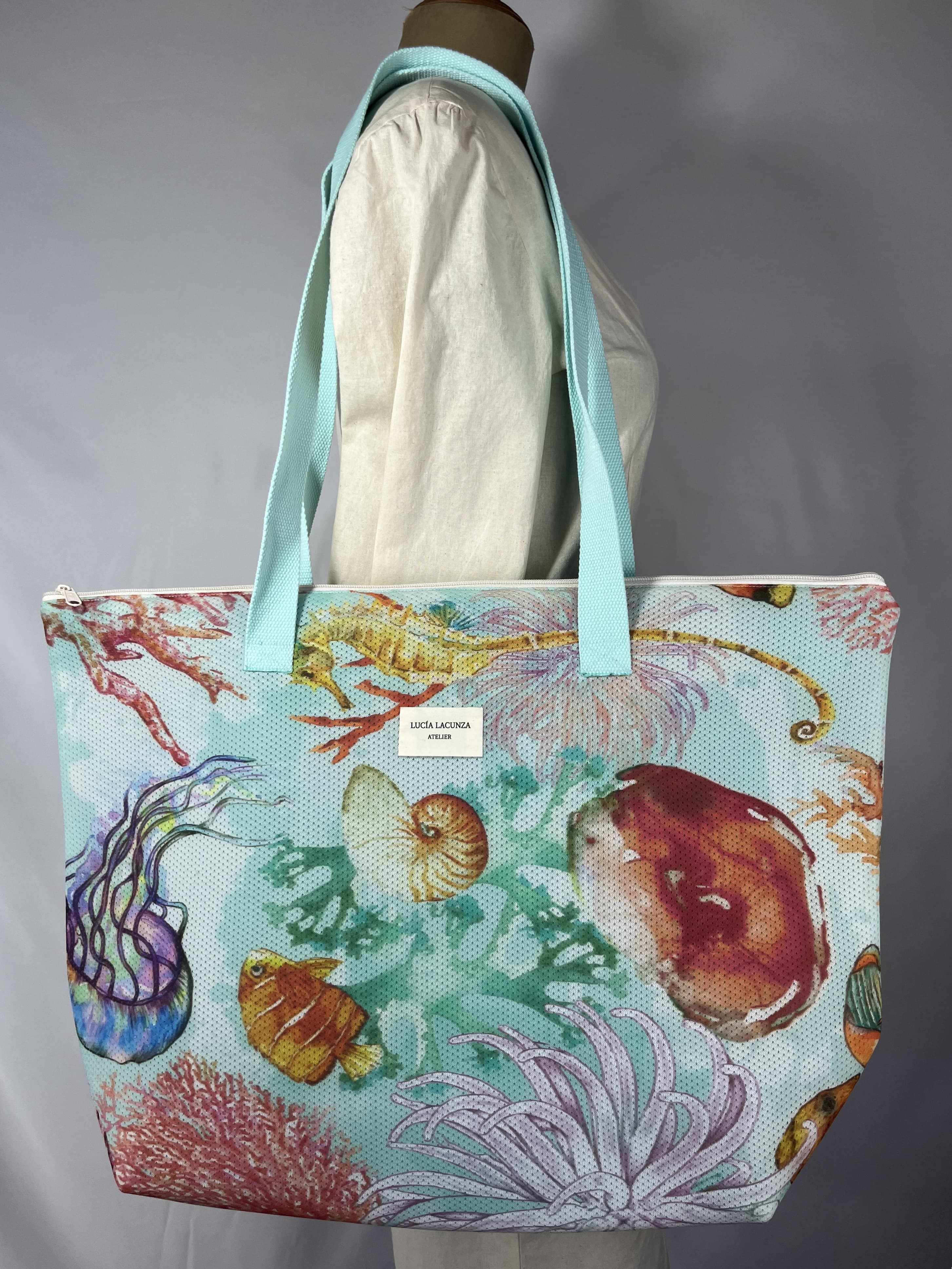 Mar de coral — bolso azul verdoso y marrón y morado y amarillo artesanal de Lucía Lacunza